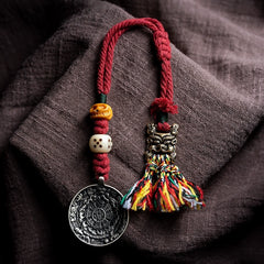 Tibetan Handwoven Amulet Tassel – Nine-Palace Charm, Bone Dice & Charnel Guardian Pendant for Bag, Car, or Waist