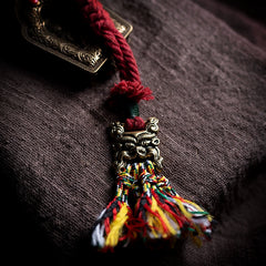 Tibetan Handwoven Amulet Tassel – Nine-Palace Charm, Bone Dice & Charnel Guardian Pendant for Bag, Car, or Waist