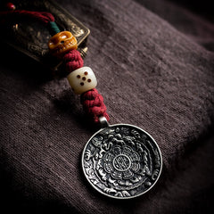 Tibetan Handwoven Amulet Tassel – Nine-Palace Charm, Bone Dice & Charnel Guardian Pendant for Bag, Car, or Waist
