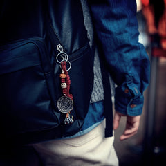 Tibetan Handwoven Amulet Tassel – Nine-Palace Charm, Bone Dice & Charnel Guardian Pendant for Bag, Car, or Waist