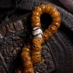 Tibetan Yak Bone Skull Bead Bracelet – Charnel Guardian, Tassel Design & Sacred Amulet Accents